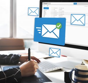 Inbox full of incoming emails and email application on a desktop screen