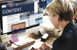 a man writing content on global news website